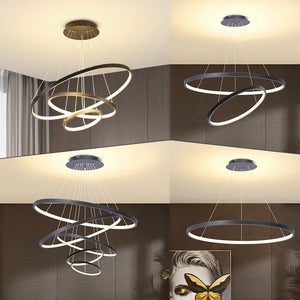 Eine Reihe von 'LuceElegante' Deckenlampen mit modernem, spiralförmigem Design in verschiedenen Größen beleuchten elegant die Räume eines Hauses mit ihrem warmweißen, energieeffizienten LED-Licht.