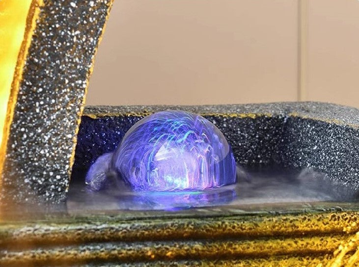Wasserbrunnen Glas Kugel beleuchtet