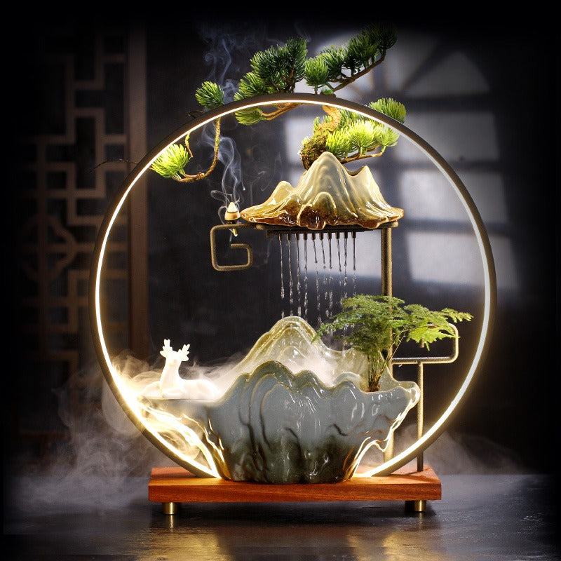 AquaLuxe indoor fountain with LED ring and fog effect